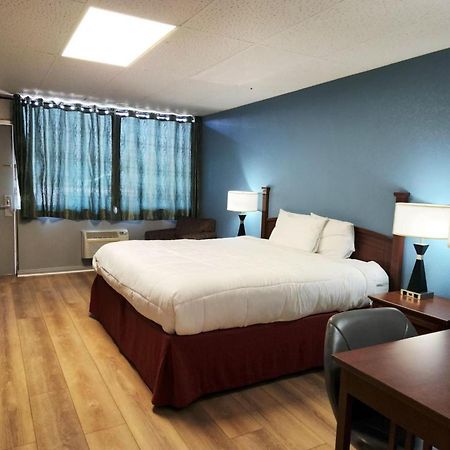 Executive Inn By Oyo Queenville Mena Exterior photo