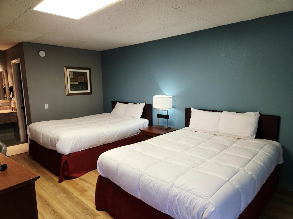 Executive Inn By Oyo Queenville Mena Exterior photo