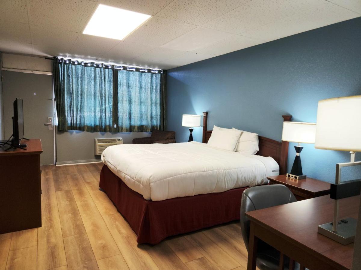 Executive Inn By Oyo Queenville Mena Exterior photo