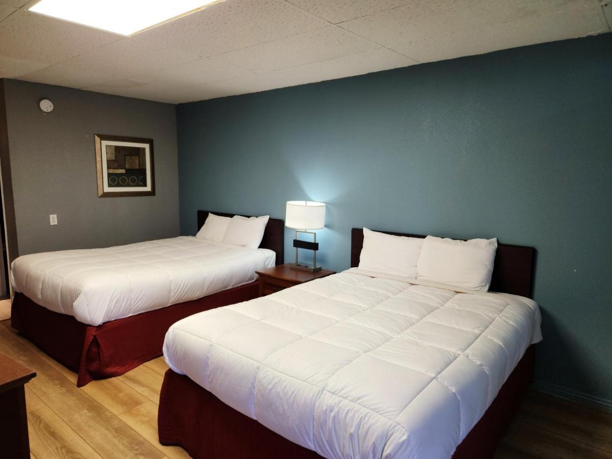 Executive Inn By Oyo Queenville Mena Exterior photo