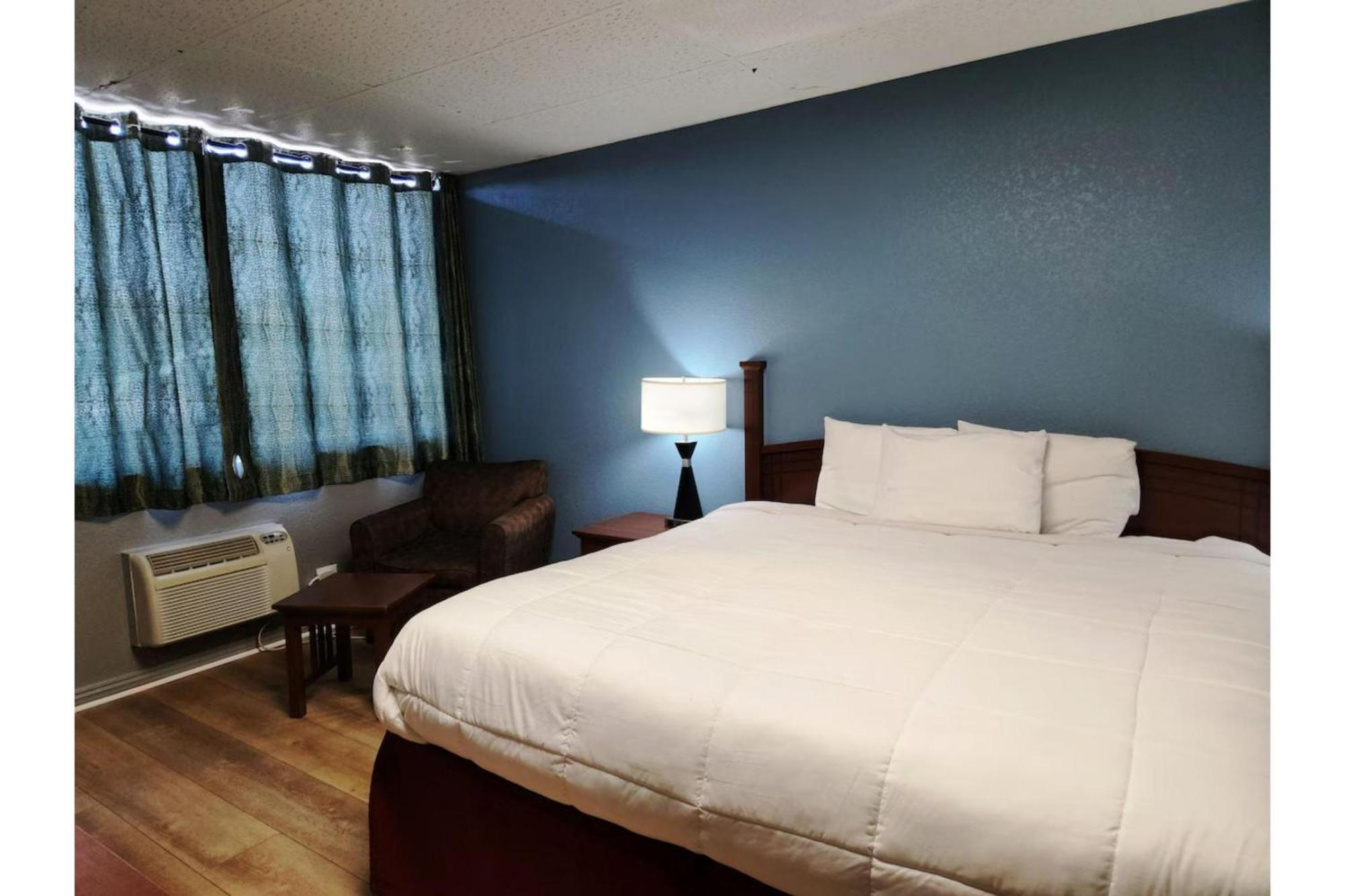 Executive Inn By Oyo Queenville Mena Exterior photo