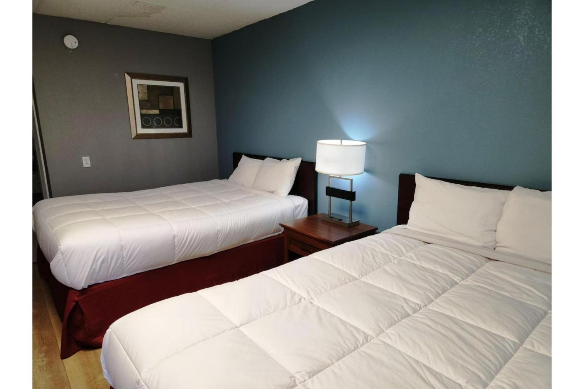 Executive Inn By Oyo Queenville Mena Exterior photo