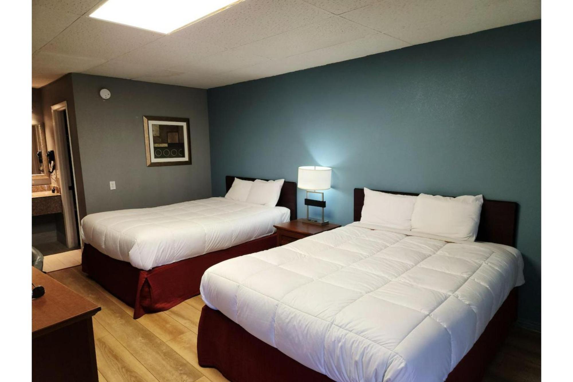 Executive Inn By Oyo Queenville Mena Exterior photo