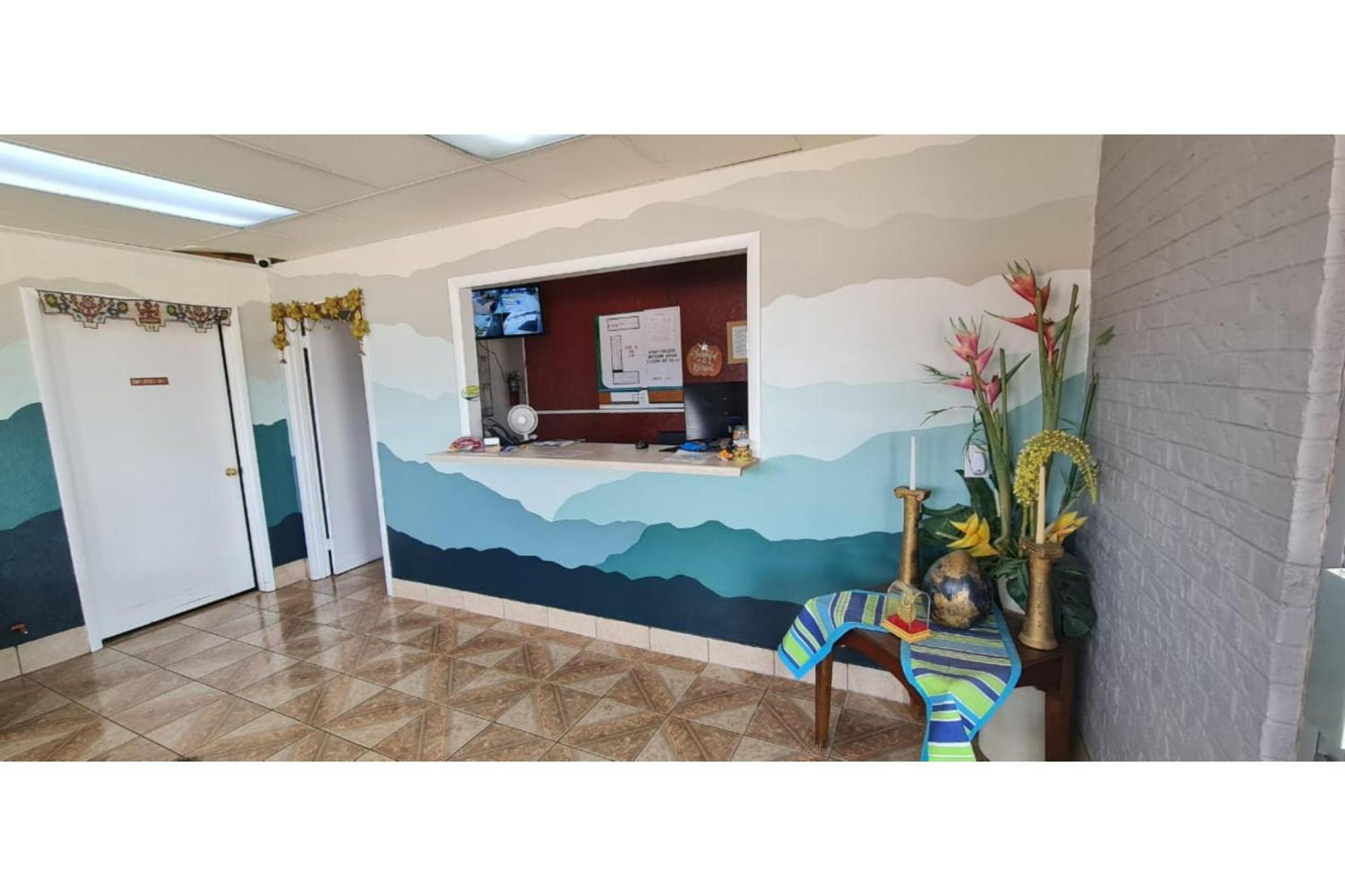 Executive Inn By Oyo Queenville Mena Exterior photo